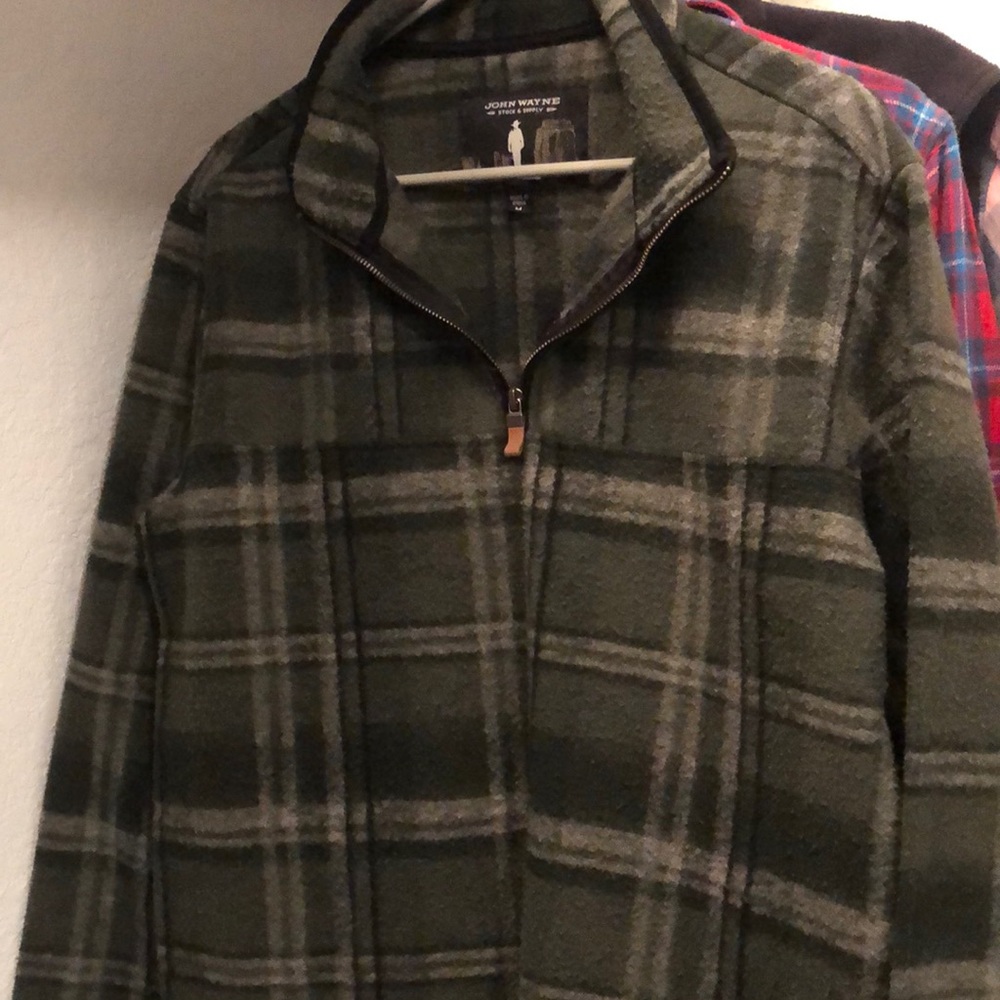 John Wayne, Medium size. Worn